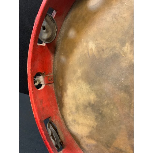 85 - An early 20th century Italian tambourine, painted with a portrait of a gentleman, 33cm diam, probabl... 