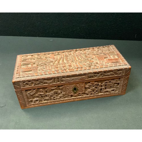 93 - A 19th century Chinese sandalwood casket, carved in the typical Cantonese manner with figures and pa... 