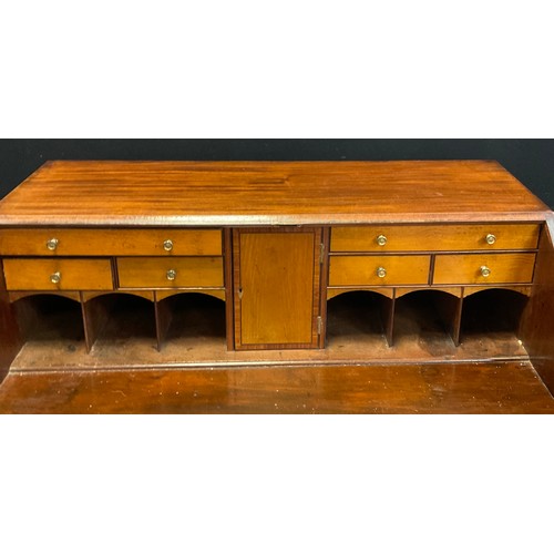 117 - A early 20th century mahogany Bureau; single draw to frieze followed by three graduated drawers, a f... 