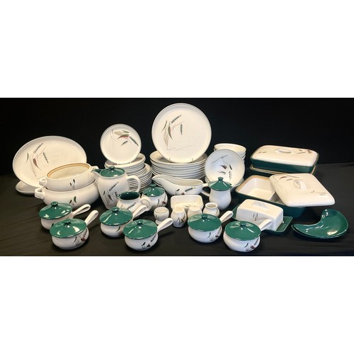 129 - A Denby 'Green Wheat' pattern part dinner service including 10 dinner plates, eight smaller, eight s... 