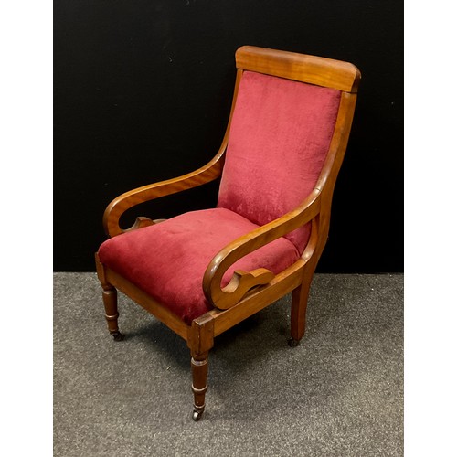 167 - A Victorian mahogany nursing chair, scrolling arms, upholstered back and seat, turned fore legs, ter... 