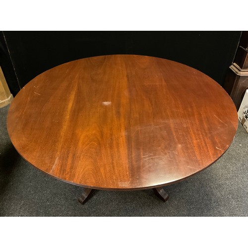 175 - A large 20th century mahogany centre table, reeded rim, four sabre leg pedestal base, scroll knees, ... 