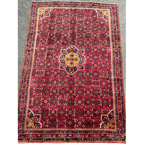 178 - A North West Persian Hussainabad carpet, hand- knotted with central geometric medallion, within a fi... 