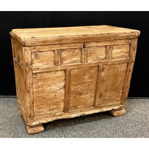 186 - A 19th century Continental distressed pine box, probably French, hinged lid, multi panelled slightly... 