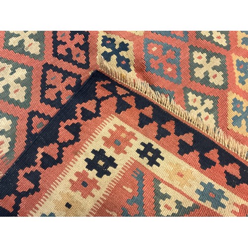 190 - A South west Persian Qashga’i Kilim rug, 116cm x 85cm.