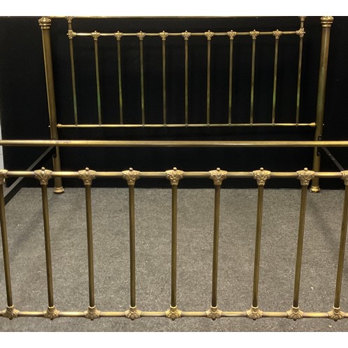 37 - A Victorian style tubular brass double bed, head and foot board, 135 cm high, 195cm wide,