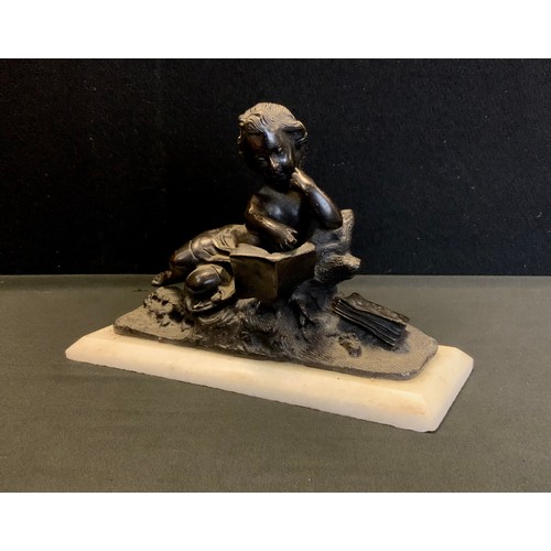 197 - A contemporary bronze coloured metal figure, After the Antique as a cherub reading, alabaster plinth... 