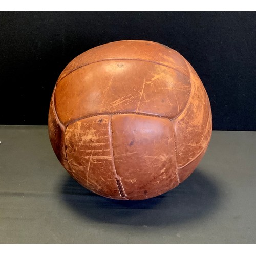 198 - An early 20th century leather Medicine Ball, approx 28cm diameter, 4kg, unnamed.