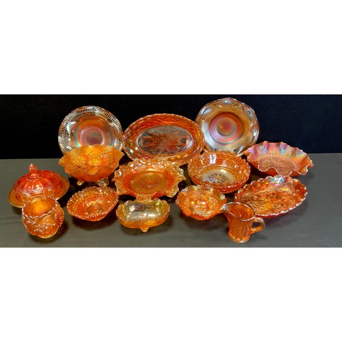 81 - A quantity of carnival glass including bowls, plates and lidded pots: etc