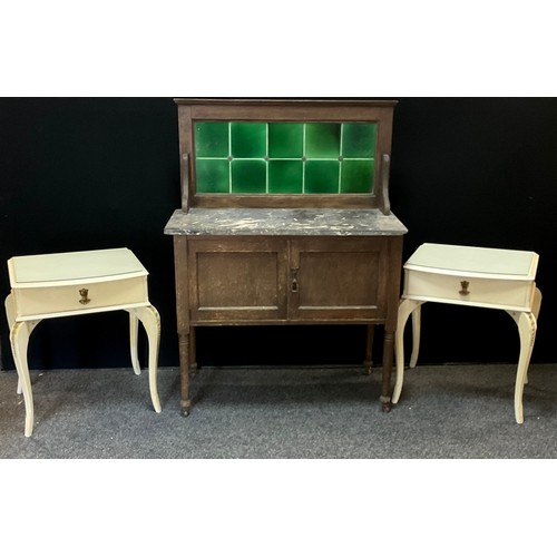 208 - A marble top washstand, green majolica tiled splashback, two door base, 120cm high, 90cm wide, 45cm ... 