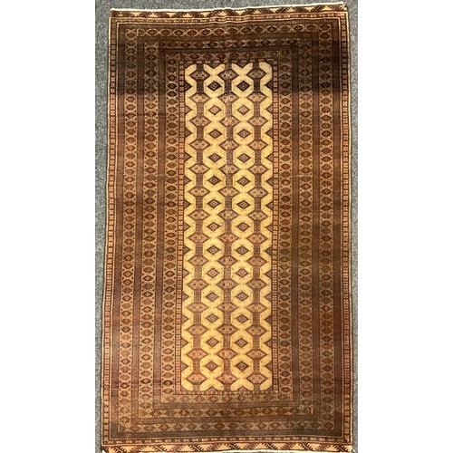 209 - A North East Persian silk and wool mix Turkoman Rug, 225cm x 124cm.