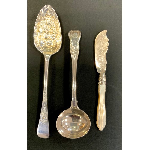 233 - A George IV silver serving spoon, embossed bowl, floral haft, William Seaman, London 1822;   William... 