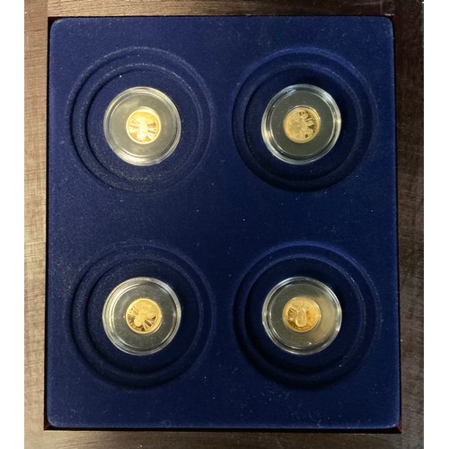 236 - Medals: a limited edition set of four 'Year of the Three Kings' .585 14ct gold medals/tokens, 0.5g e... 