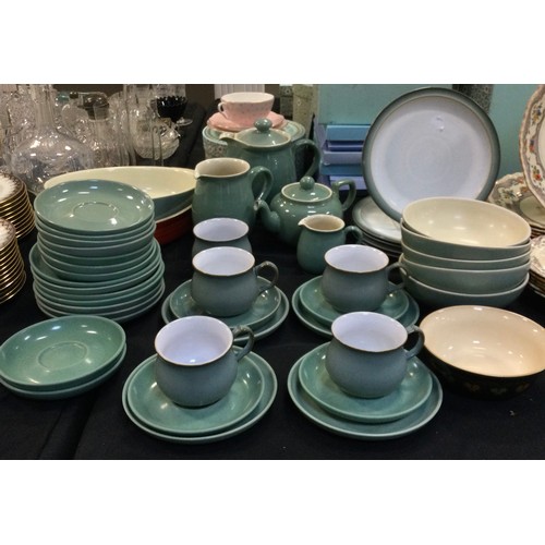 144 - A Denby tea service, in celadon green for four including tea pot, coffee pot, four tea cups and sauc... 