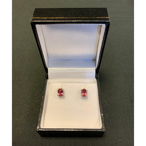 314 - A pair of pink tourmaline stud earrings, silver mounts, stamped 925.