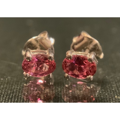 314 - A pair of pink tourmaline stud earrings, silver mounts, stamped 925.