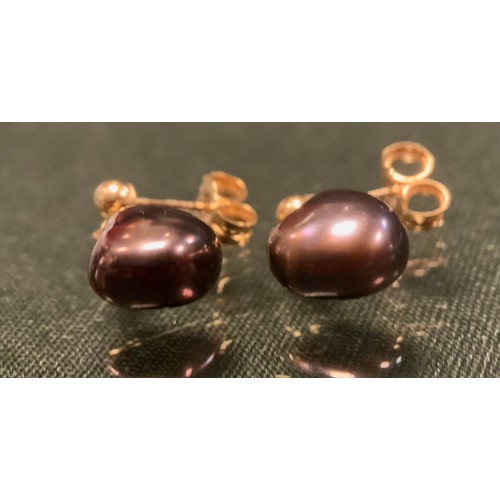 262 - A pair of baroque black pearl drop earrings, 9ct gold mounts, 1.7g gross