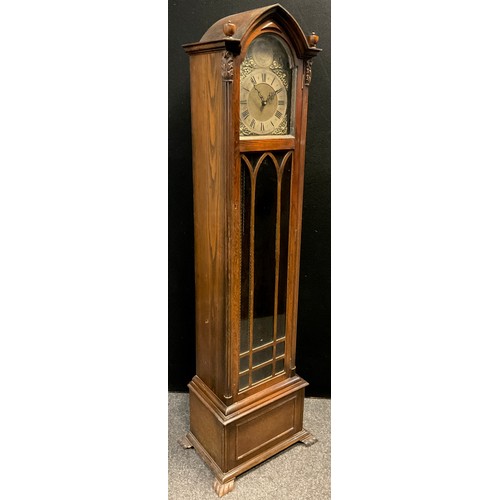 51A - A Gothic Revival oak longcase clock, 30-day musical, chiming movement, brass dial, Roman numerals. T... 