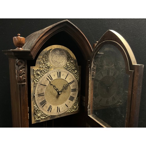 51A - A Gothic Revival oak longcase clock, 30-day musical, chiming movement, brass dial, Roman numerals. T... 