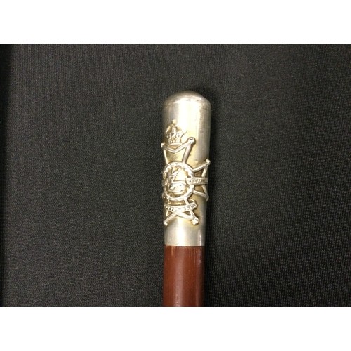 45A - A swagger/parade stick with crest, 72cm long, another; women’s walking stick. One country walking st... 