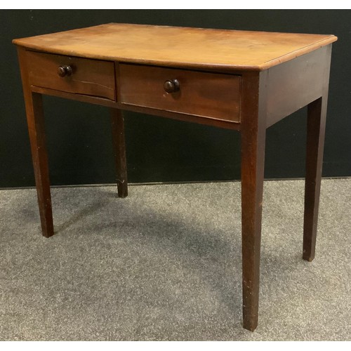 89A - A early 19th century mahogany side table , over sailing top, pair of draws to frieze, tapered legs. ... 