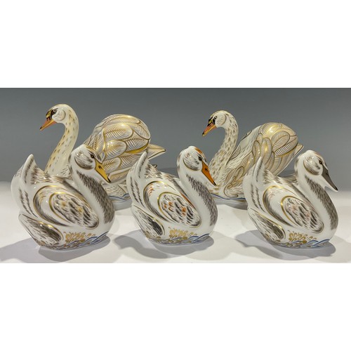 8 - A Royal Crown Derby paperweight family group, The Royal Swans and Cygnets, William and Kate, George,... 