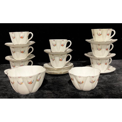 13 - A Foley Wileman tea set comprising eight breakfast teacups, twelve saucers, slop bowl and sugar bowl... 