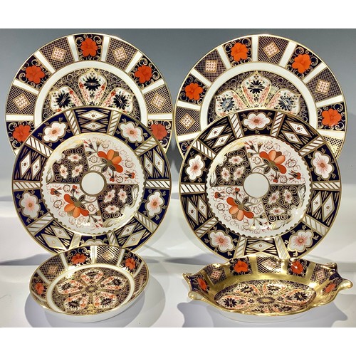 37 - A pair of Royal Crown Derby Imari 1128 pattern side plates, 21.5cm, seconds; an 1128 oval pin tray a... 