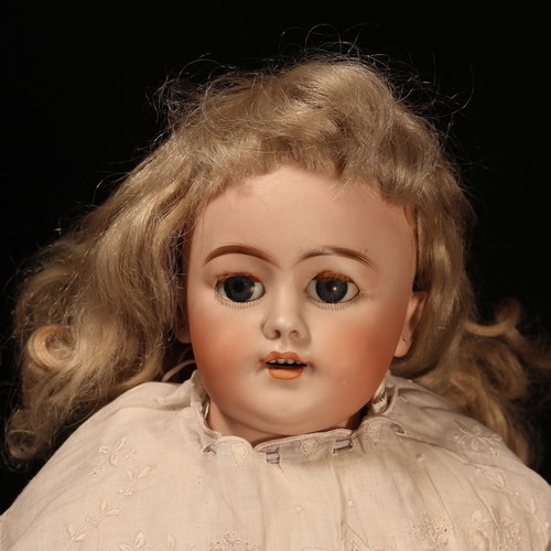 29 - A Simon & Halbig (Germany) bisque shoulder head doll, the bisque head with weighted sleeping blue gl... 