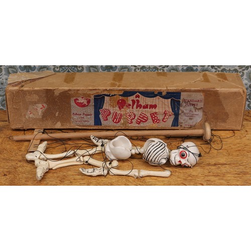 58 - A Pelham Puppets Disjointed Skeleton standard puppet, painted white and picked out in black, fixed b... 