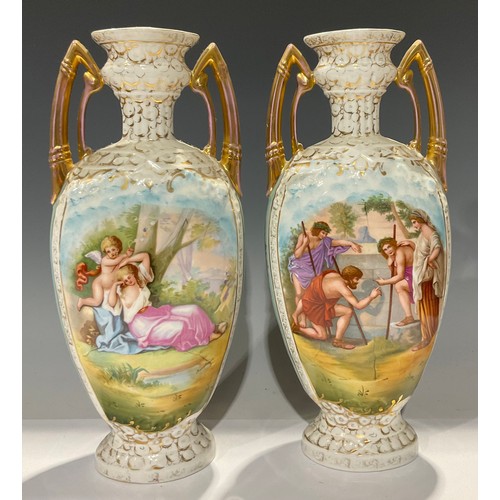 67 - A pair of Sitzendorf flattened ovoid two handled pedestal vases, transfer printed with cupids and ot... 