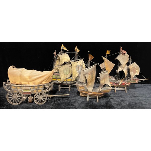 76 - A scratch built painted wooden model of a Man O' War ship, hide sails, stand, 47cm overall; others s... 