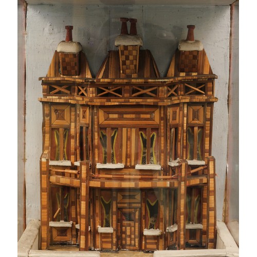 174 - An early 19th century Napoleonic prisoner of war straw work model, in the form of a facade of a hous... 