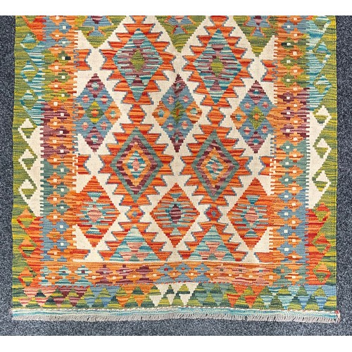 236 - Carpets - a Chobi Kilim woollen runner or rug, multi-coloured geometric shapes, 163cm x 100cm