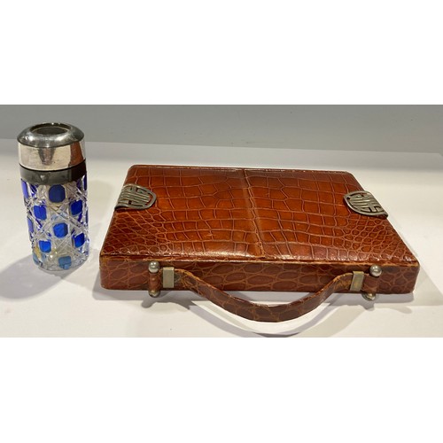 435 - Lady's Accessories - a Fortnum & Mason, London, crocodile skin travelling vanity case/purse, split h... 