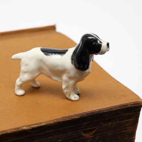 449 - A Beswick model of a Cocker Spaniel Dog, 7cm high