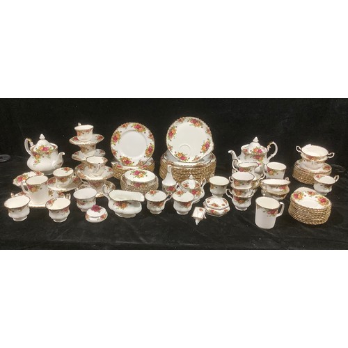 487 - A Royal Albert Old Country Roses part dinner and tea service comprising two large teapots, twelve di... 