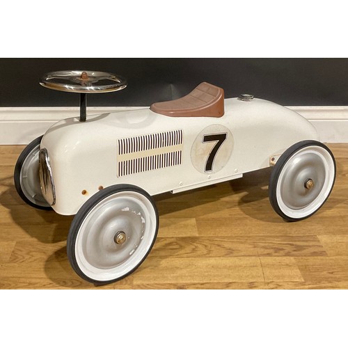 53 - Toys & Juvenalia - a ‘vintage’ style children’s ride-on speedster car, the white powder coated body ... 