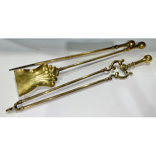 510 - A set of three Victorian brass fire irons