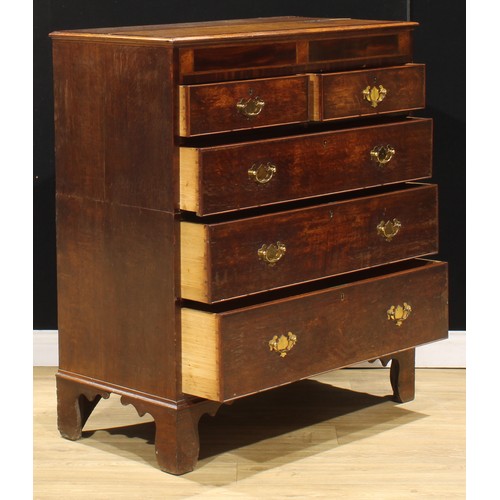 102 - A George III oak and mahogany chest, of two short and three long graduated drawers, bracket feet, 11... 