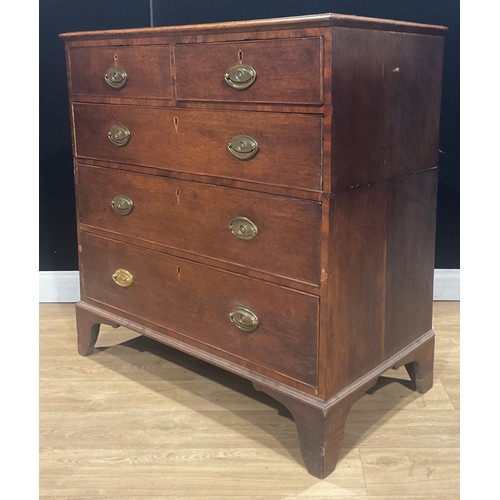 104 - A George III mahogany banded oak chest, of two short and three long graduated drawers, 100.5cm high,... 