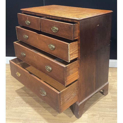 104 - A George III mahogany banded oak chest, of two short and three long graduated drawers, 100.5cm high,... 