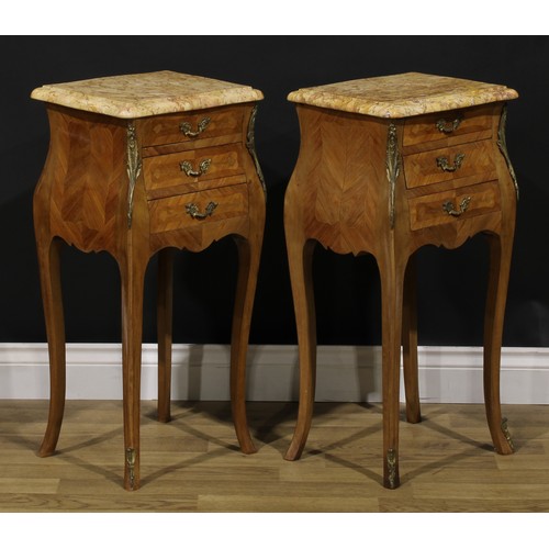 109 - A pair of Louis XV Revival gilt metal mounted marquetry tables de chevet, each with a marble top abo... 