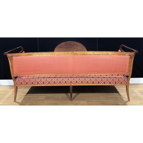 111 - A late 19th century campaign sofa, dismantling for transport, the back with fluted fan cresting, tur... 