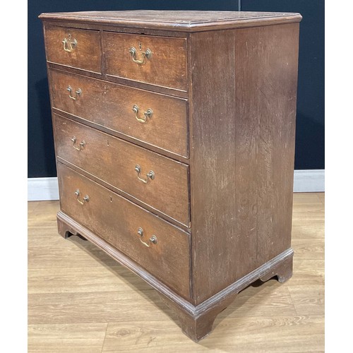 114 - A George III oak chest, of two short and three long graduated drawers, skirted base, bracket feet, 1... 