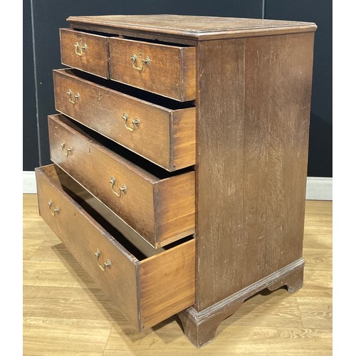 114 - A George III oak chest, of two short and three long graduated drawers, skirted base, bracket feet, 1... 