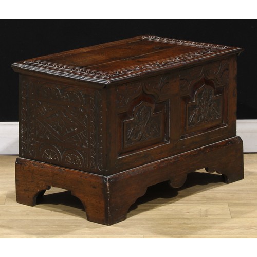 120 - A 17th century style oak blanket chest, of small proportions, 45.5cm high, 69.5cm wide, 41.5cm deep