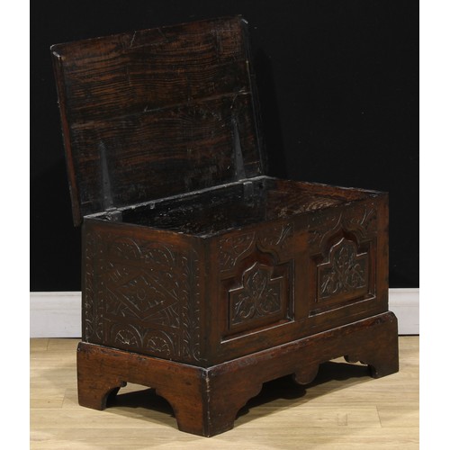 120 - A 17th century style oak blanket chest, of small proportions, 45.5cm high, 69.5cm wide, 41.5cm deep