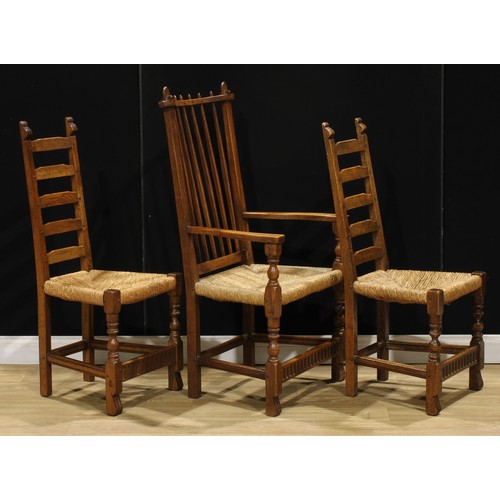 206 - A harlequin trio of oak dining chairs, probably Rupert/Nigel Griffiths Monastic Woodcraft, one side ... 