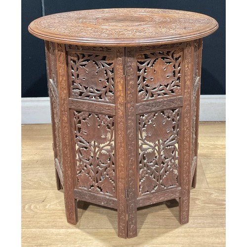 209 - An Anglo-Indian hardwood Hoshiarpur table, 54.5cm high, 53cm diameter; a similar three-fold screen, ... 